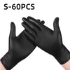 A pair of black disposable nitrile gloves shown in a close-up view.
