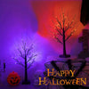 Dekorativer Birkenbaum mit orange- und violetten LED-Lichtern in Halloween-Stimmung.