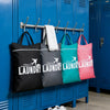 A row of blue storage cabinets displaying various colored laundry bags hanging on a rack.