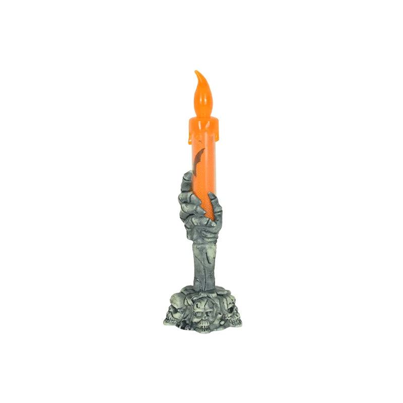 A skeleton hand holding an orange candle with a flame, used as a Halloween LED light.