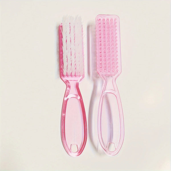A set of pink multi-purpose brushes for nail art and dust cleaning, including a flat brush and a round brush.