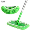A bright green reusable microfiber swiffer mop cloth with a silver handle and green cleaning pad.