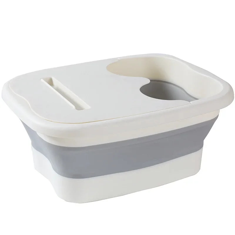 A white and gray foldable foot soak bucket designed for therapeutic massage.