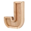 Piggy bank alphabet shaped like the letter J for savings.