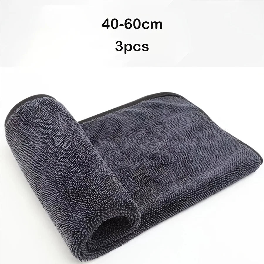 A stack of three dark gray microfiber car cleaning towels, measuring 40-60cm each.