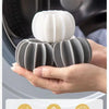 A hand holds a gray laundry ball cleaning tool used for small and large use.