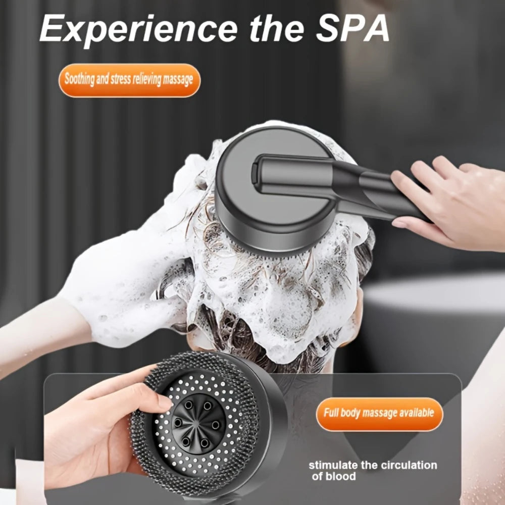 A hand is using a black shower head to provide soothing and stress relieving massage on a person's head.