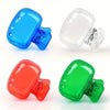 Cuatro fundas de silicona para cepillos de dientes y viajes en azul, transparente, rojo y verde.