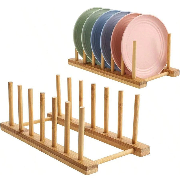 A set of bamboo dish drying racks and organizers holding several colored plates.