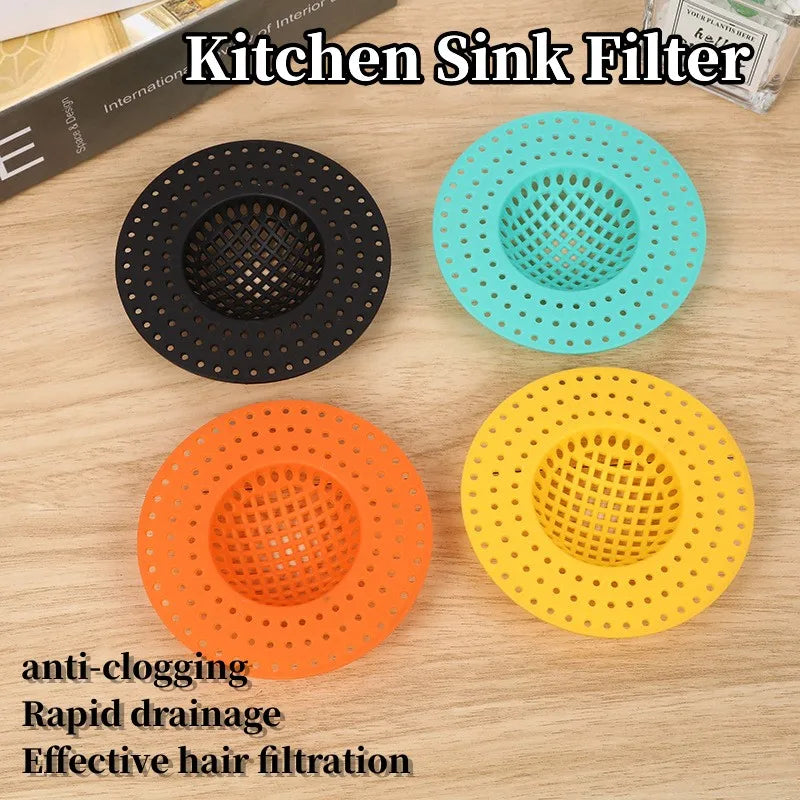Four colored kitchen sink filters including black, teal, orange, and yellow for effective hair filtration