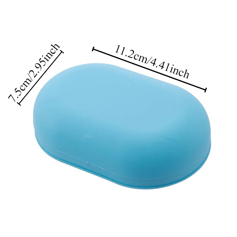 Light blue portable soap holder with a lid, measuring 7.5cm thick and 11.2cm long.