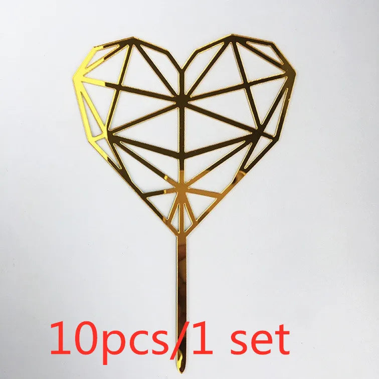 Gold geometric heart cake topper with a thin stick for decoration