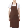 A brown adjustable unisex cooking apron worn by a person.