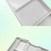A white dental autoclavable cabinet tray organizer shown in two views, displaying divided compartments for organization.