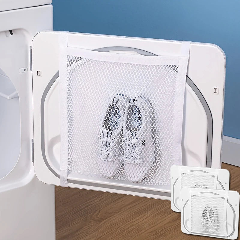 A white portable shoe washing mesh bag is shown inside a white appliance for cleaning shoes.