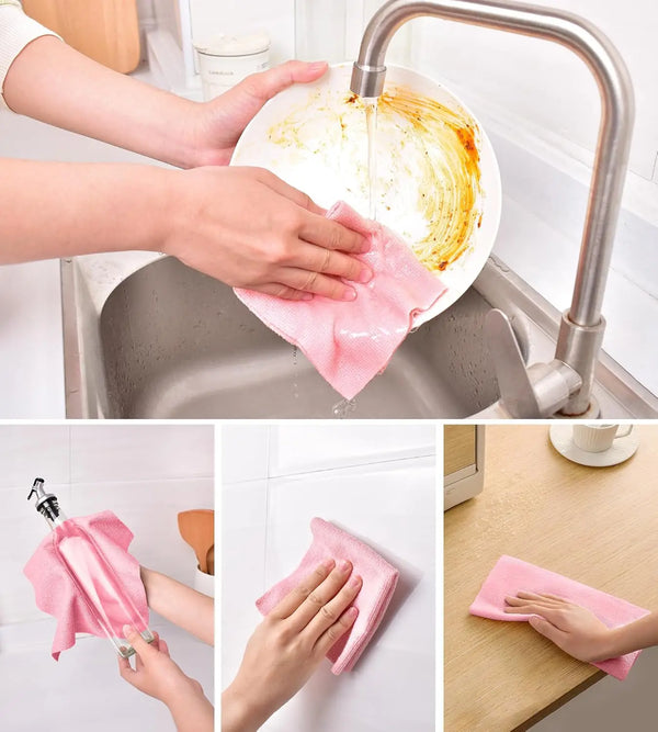 Hands are using pink reusable microfiber cleaning cloths to wash dishes in a kitchen sink.