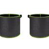 A pair of black breathable fabric plant grow bags with green trim and handles.