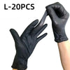A hand wearing a black disposable glove is shown, with another gloved hand touching it. The product is L-20PCS of black nitri