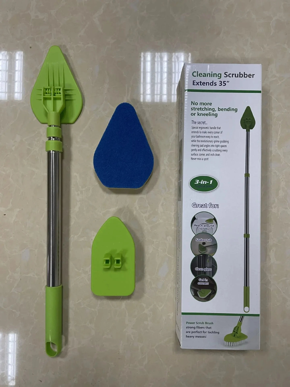 A cleaning scrubber extends 35 inches, featuring a green handle and a triangular brush head.