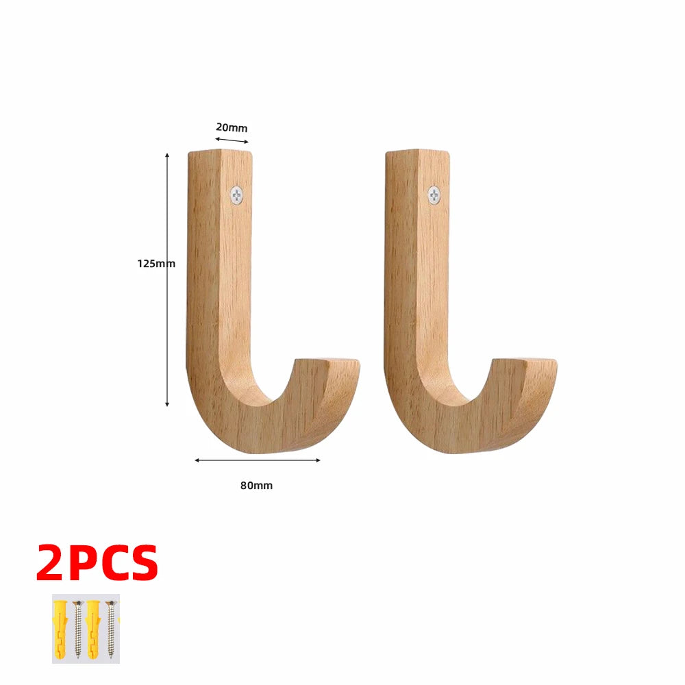 Two natural oak wood wall hooks with screws, showing dimensions and installation style.