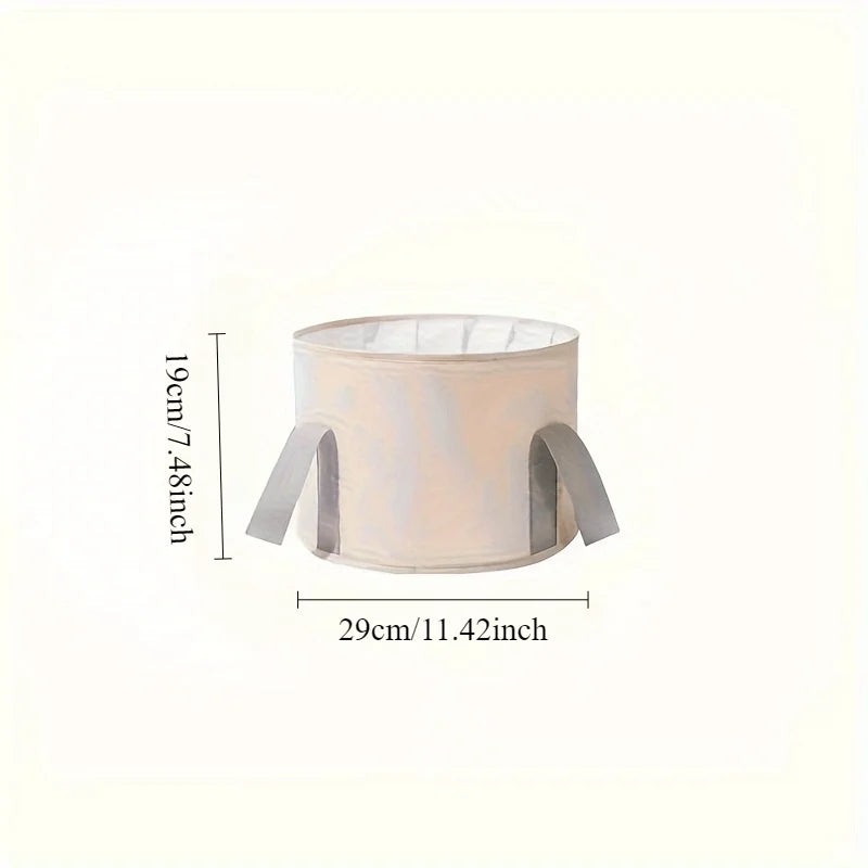A light beige portable folding foot soak tub with a removable lid and handles.