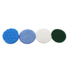 A set of four electric cleaning brush heads in blue, purple, white, and green.