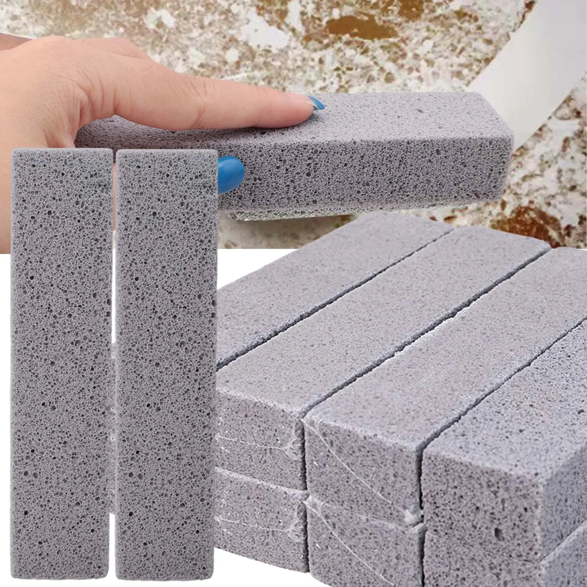 A hand is holding a gray reusable cleaning pumice stone stick, showing its texture and shape.