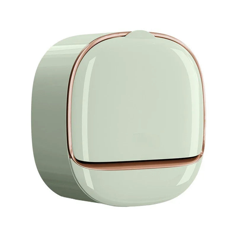 A round, light green wall-mounted soap dish with a lid and drainage feature.