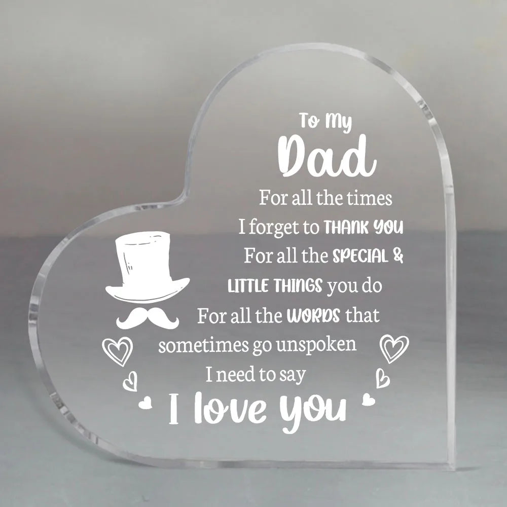 A clear acrylic heart-shaped keepsake engraved with the message To my Dad For all the times I forget to thank you For all the