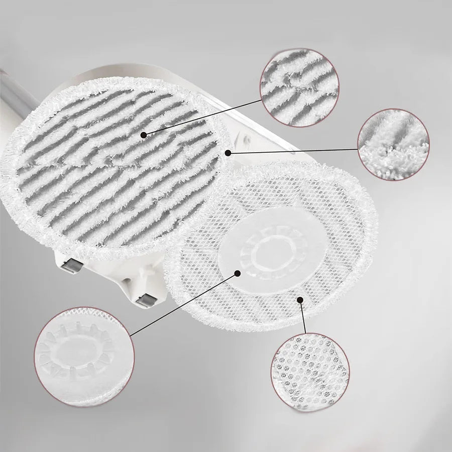 Close-up view of replacement mop cloth pads for a Shark vacuum cleaner showing various textures and designs.