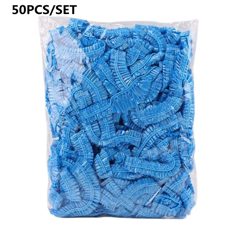 50 pieces of blue reusable transparent shower caps packaged in a clear plastic bag