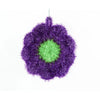 A spherical dish towel made of purple and green fluffy synthetic fibers.