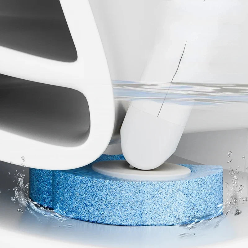 A reusable toilet cleaning brush set is shown submerged in water, with a white cleaning head and a blue cleaning pad.