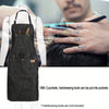 A dark gray denim tool apron with three pockets is shown being worn by a person.