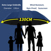 A family of four is shown holding an extra large blue umbrella with a 130cm diameter against a dark background.