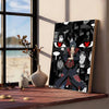 A dark, dramatic canvas wall art poster featuring stylized faces with intense red eyes.