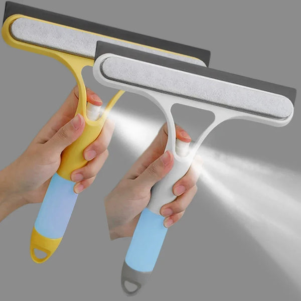 Hände halten ein gelb-weißes 3-in-1 Fensterreinigungs-Schneidgummi und Wischer-Set, das zur Reinigung einer Oberfläche verwen
