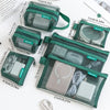 A set of six transparent mesh storage bags in dark green and light gray, showing various electronic accessories inside.