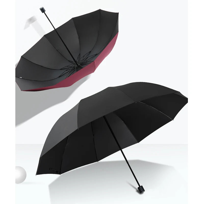 A black and red extra large windproof folding umbrella shown in two angles.
