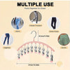 Percha de acero inoxidable rosa con múltiples clips para organizar pantalones y almacenamiento en el clóset.