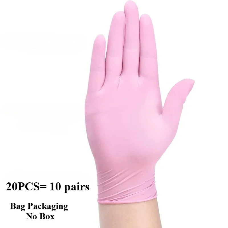 A hand wearing a pink disposable nitrile glove is shown against a white background.