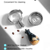 Un juego de filtros de café desmontables y un asa corta para un portafiltro de máquinas de espresso.