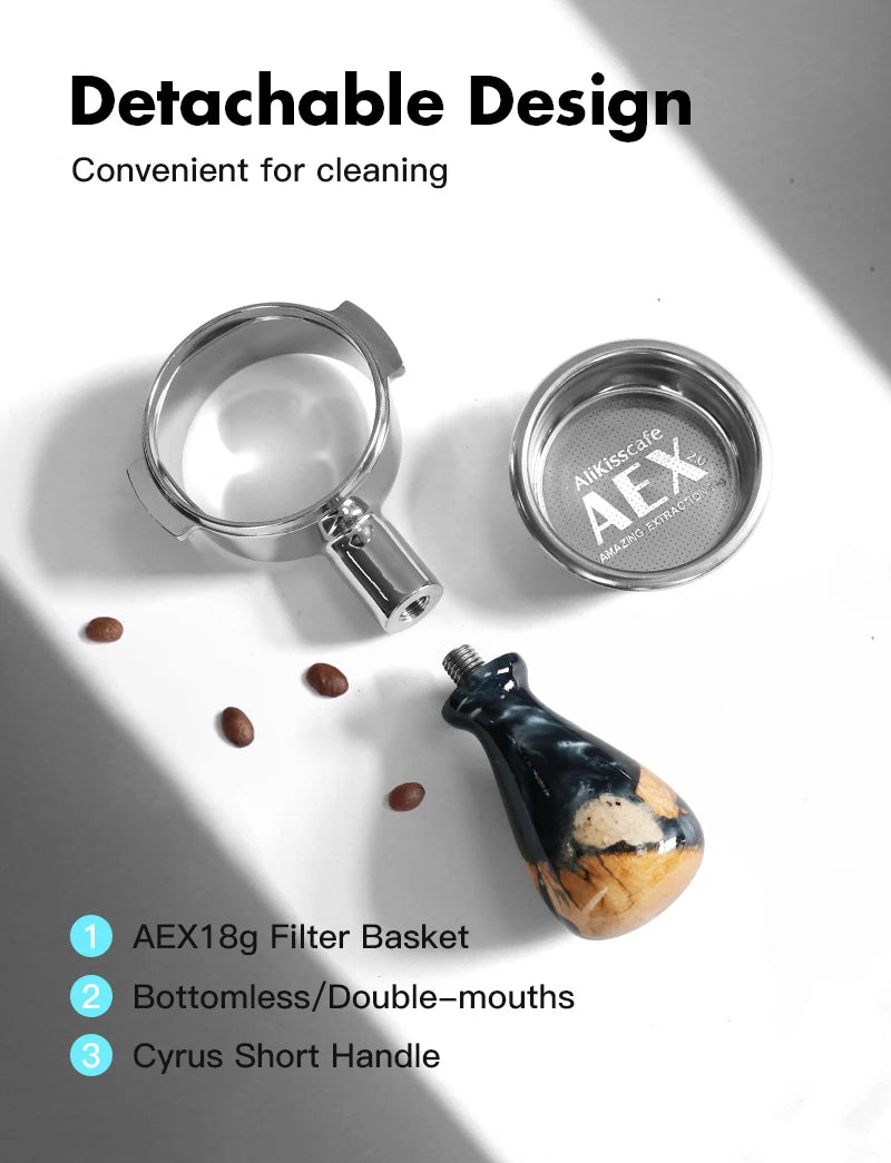 Un juego de filtros de café desmontables y un asa corta para un portafiltro de máquinas de espresso.