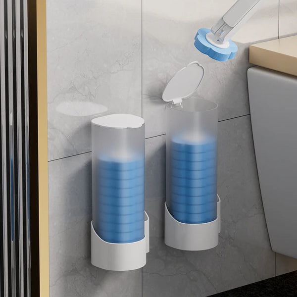 A wall-mounted disposable toilet brush with a blue cleaning solution is shown mounted on a gray tiled wall.