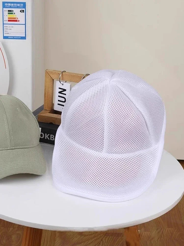 White mesh reusable laundry bag designed to protect hats