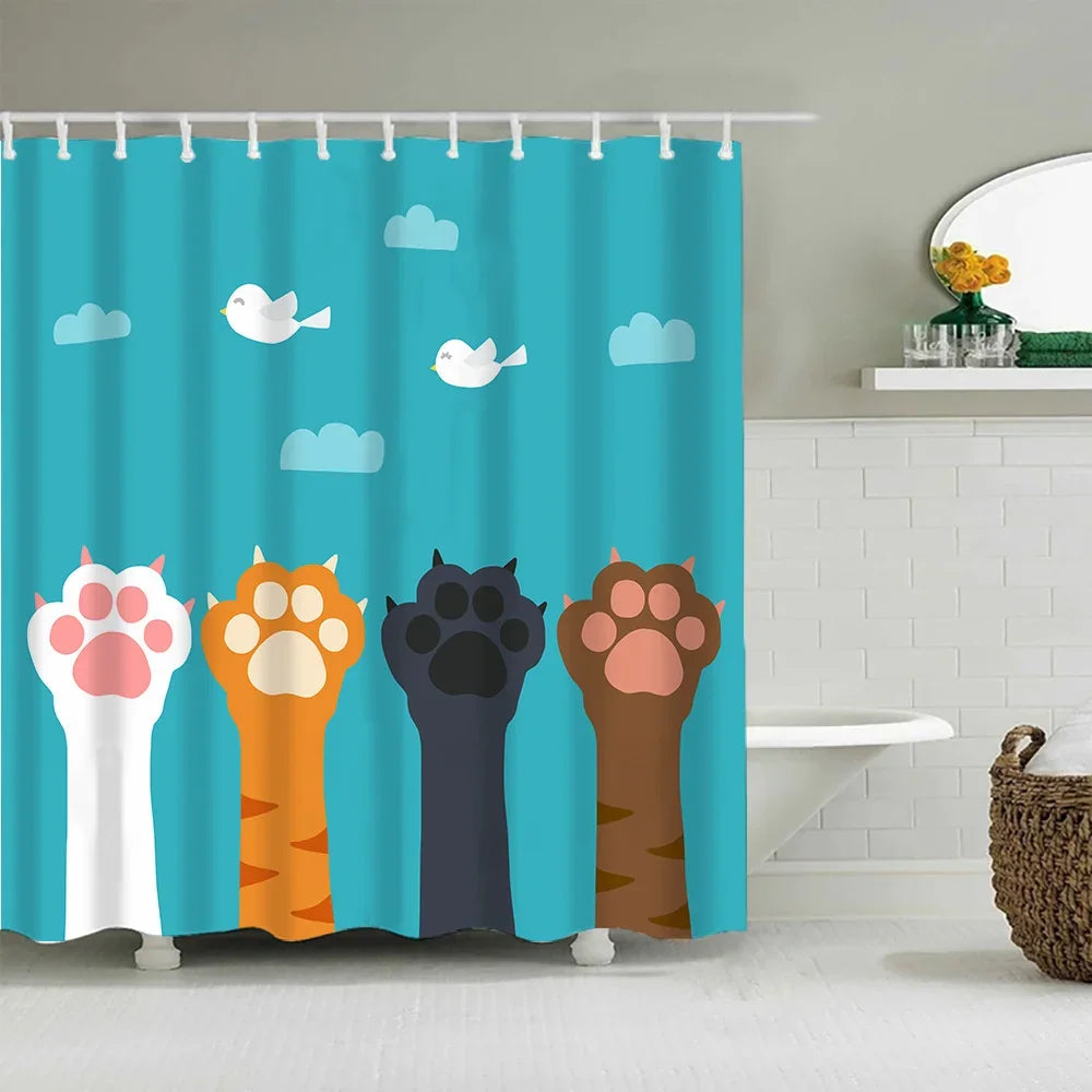 A shower curtain featuring cute cartoon paw prints and flying white birds on a teal background.