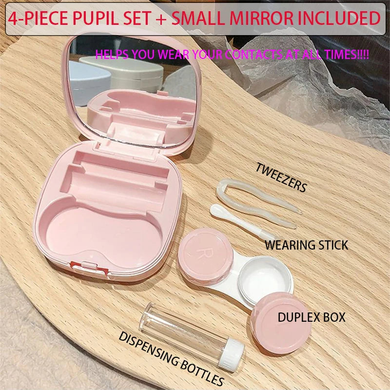 Pinkes 4-teiliges Pupillenset mit kleinem Spiegel und Accessoires auf einer Holzoberfläche.