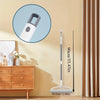 A white ergonomic detachable magic broom and scraper set displayed against a light wall with a wooden cabinet.