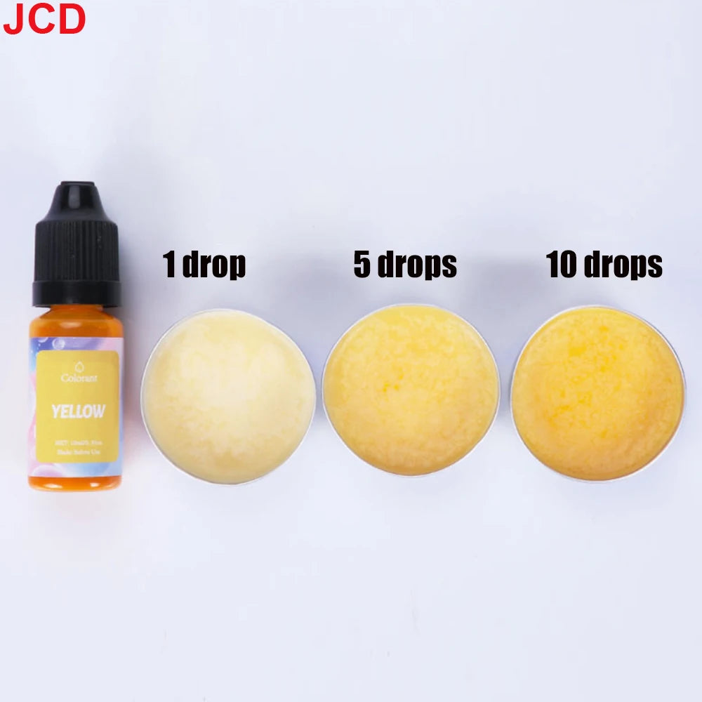 A set of yellow liquid candle dye in dropper bottles showing 1, 5, and 10 drops applied to a yellow wax product.