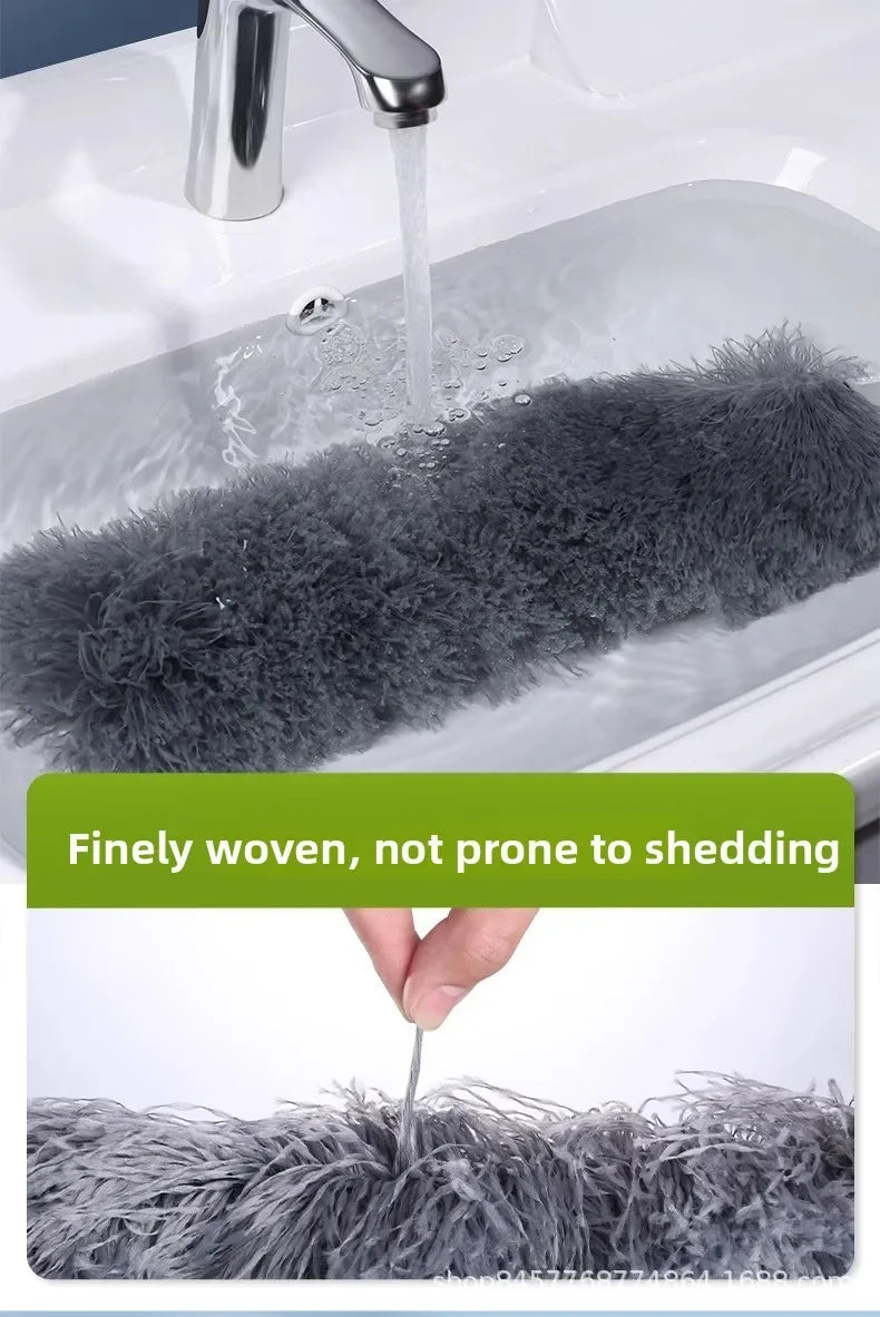 A close-up of a gray microfiber dust duster being used to clean a sink, highlighting its fine weave.
